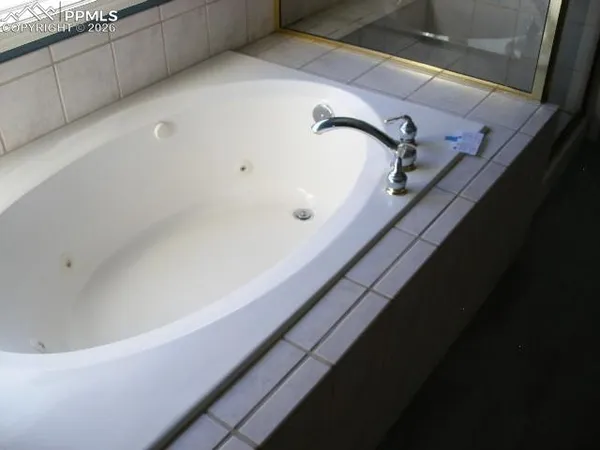 a view of a bathtub in bathroom