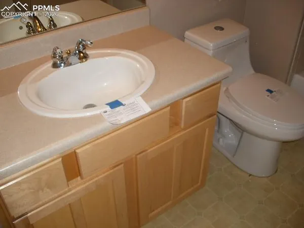a bathroom with a sink and toilet