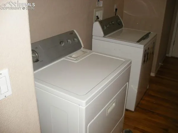 a utility room with dryer and washer