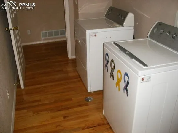 a utility room with dryer and washer