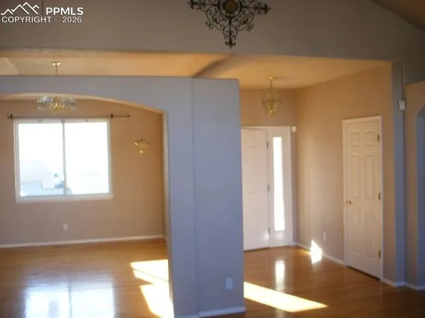 a view of an empty room with a window