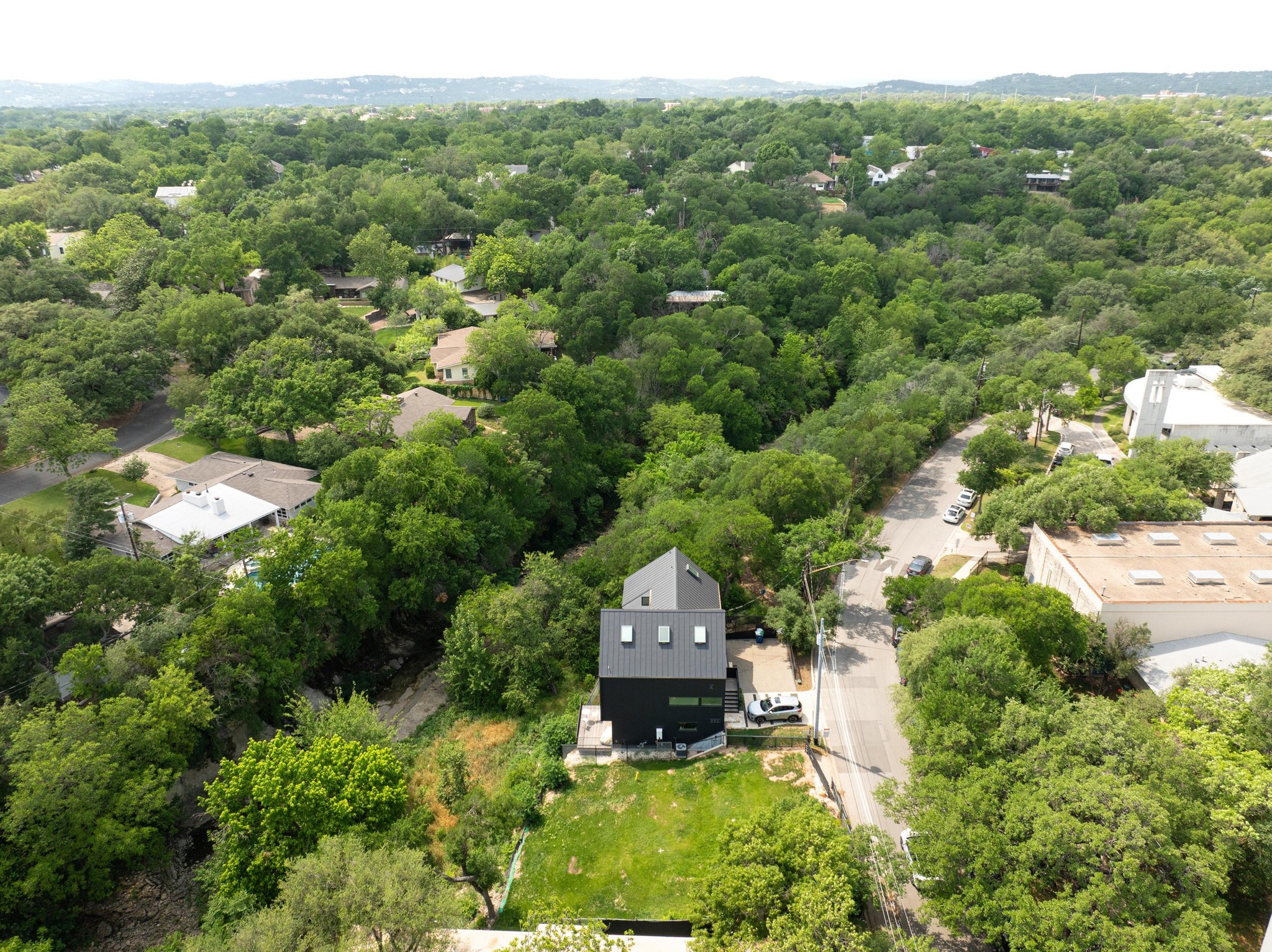 1113 West 31st Street Austin, TX 78705 - Photo 14 of 15 an aerial view of a house with a yard