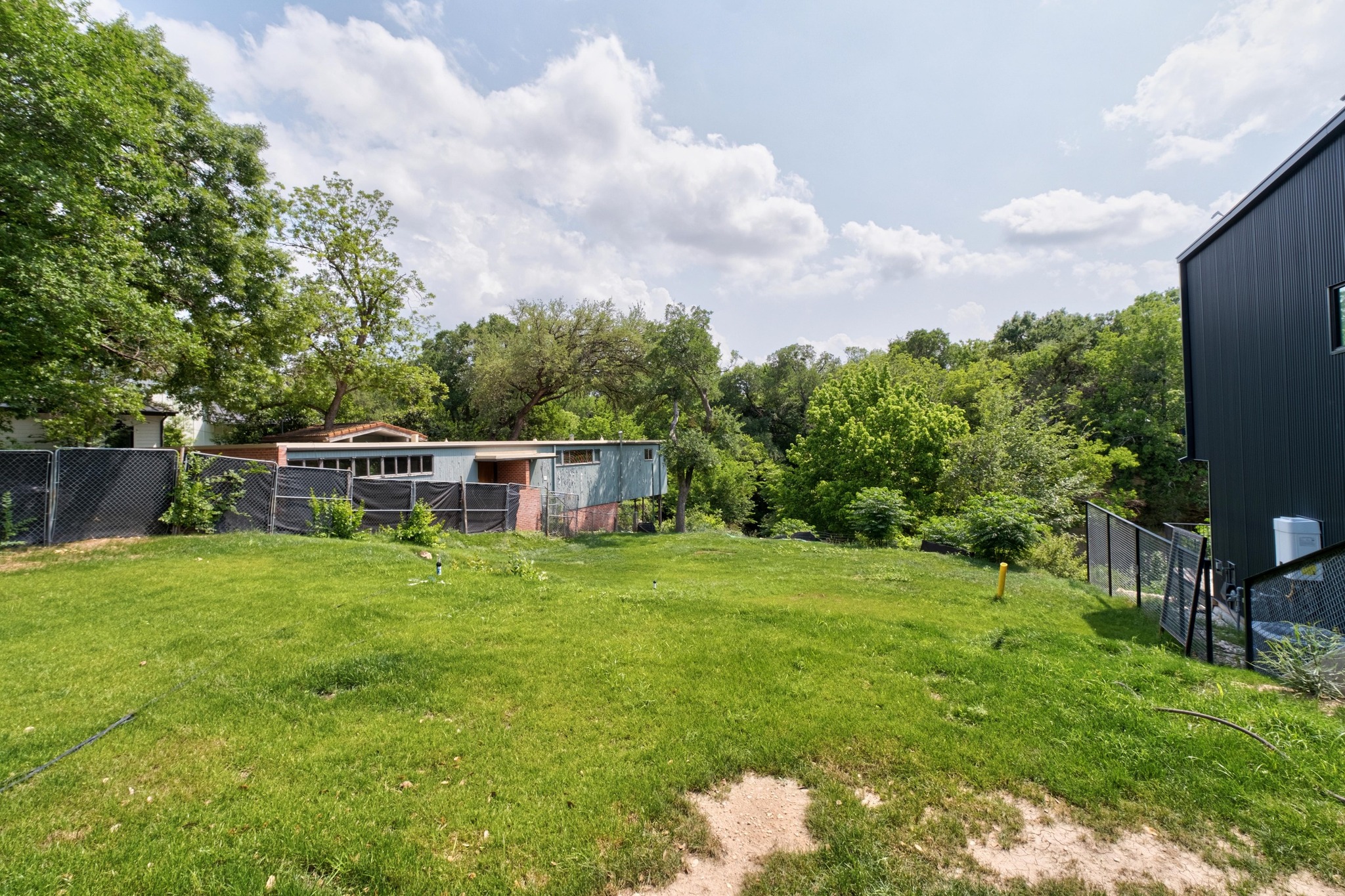 1113 West 31st Street Austin, TX 78705 - Photo 6 of 15 a front view of a house with a yard