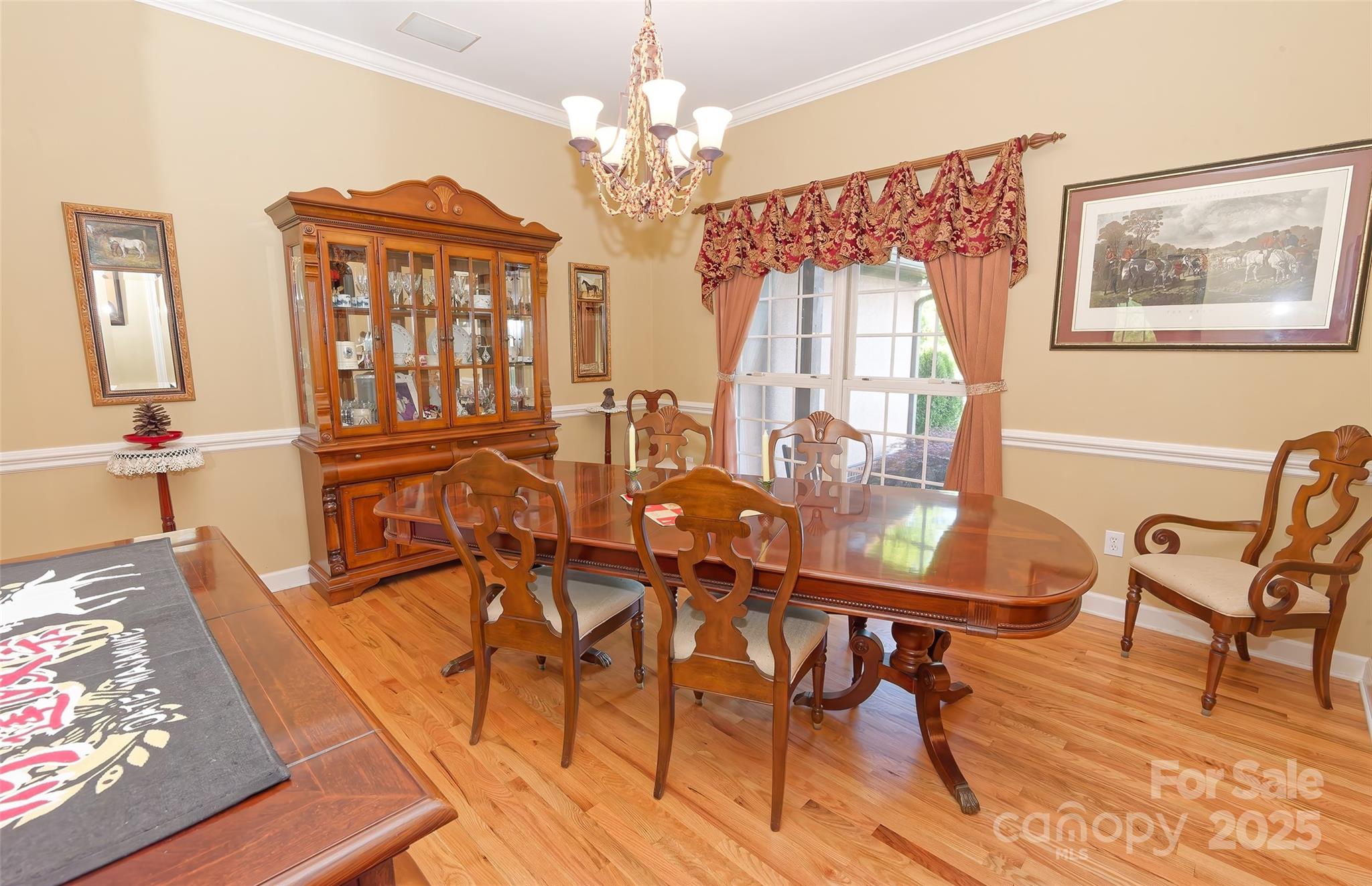 1250 Mountain Creek Road Rutherfordton, NC 28139 - Photo 17 of 48 a view of a dining room with furniture and chandelier