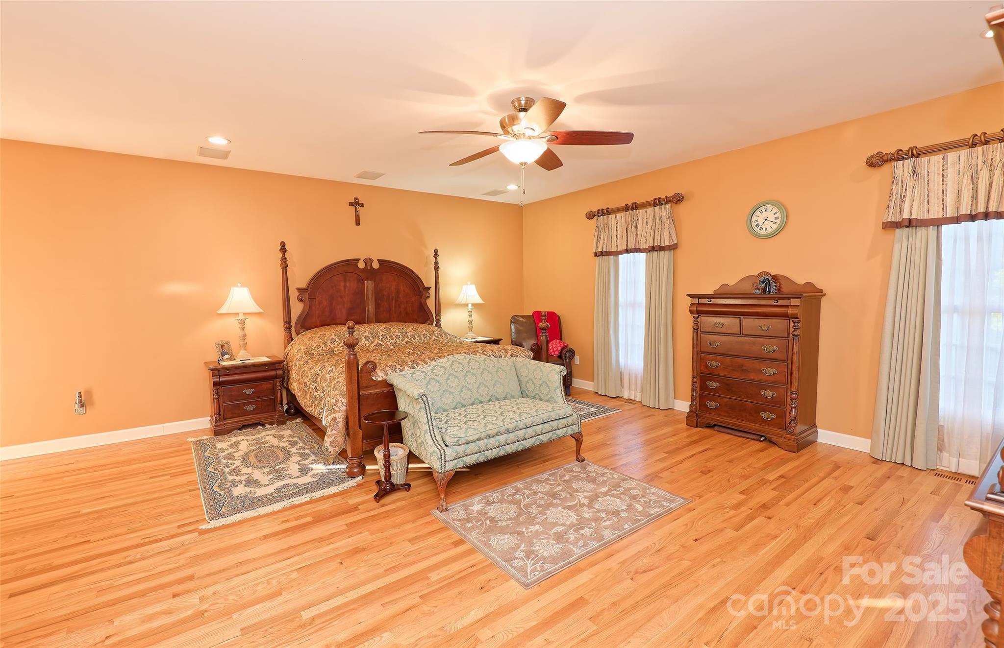 1250 Mountain Creek Road Rutherfordton, NC 28139 - Photo 21 of 48 a bedroom with a bed and wooden floor