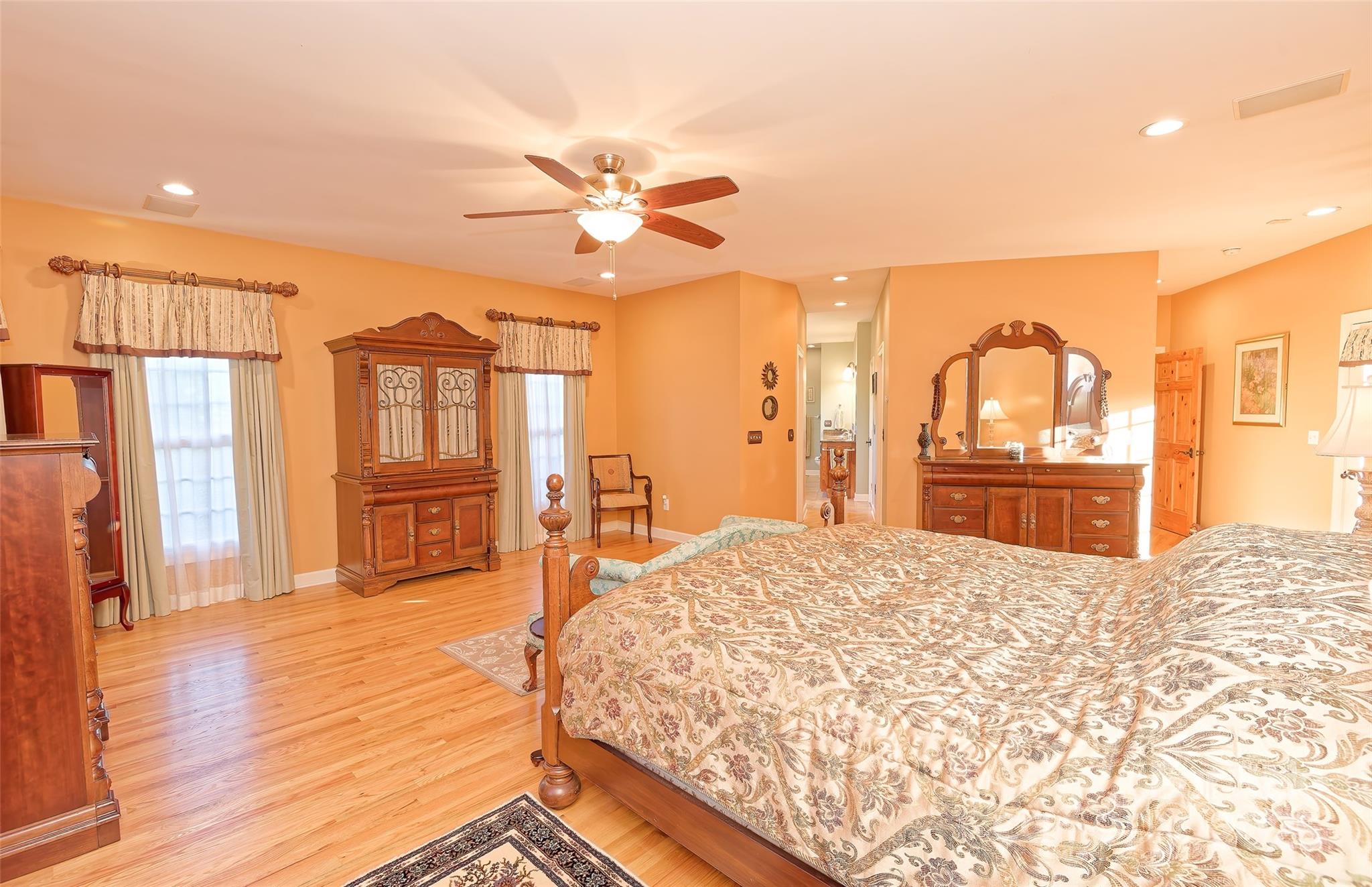 1250 Mountain Creek Road Rutherfordton, NC 28139 - Photo 22 of 48 a bedroom with a bed closet and wooden floor