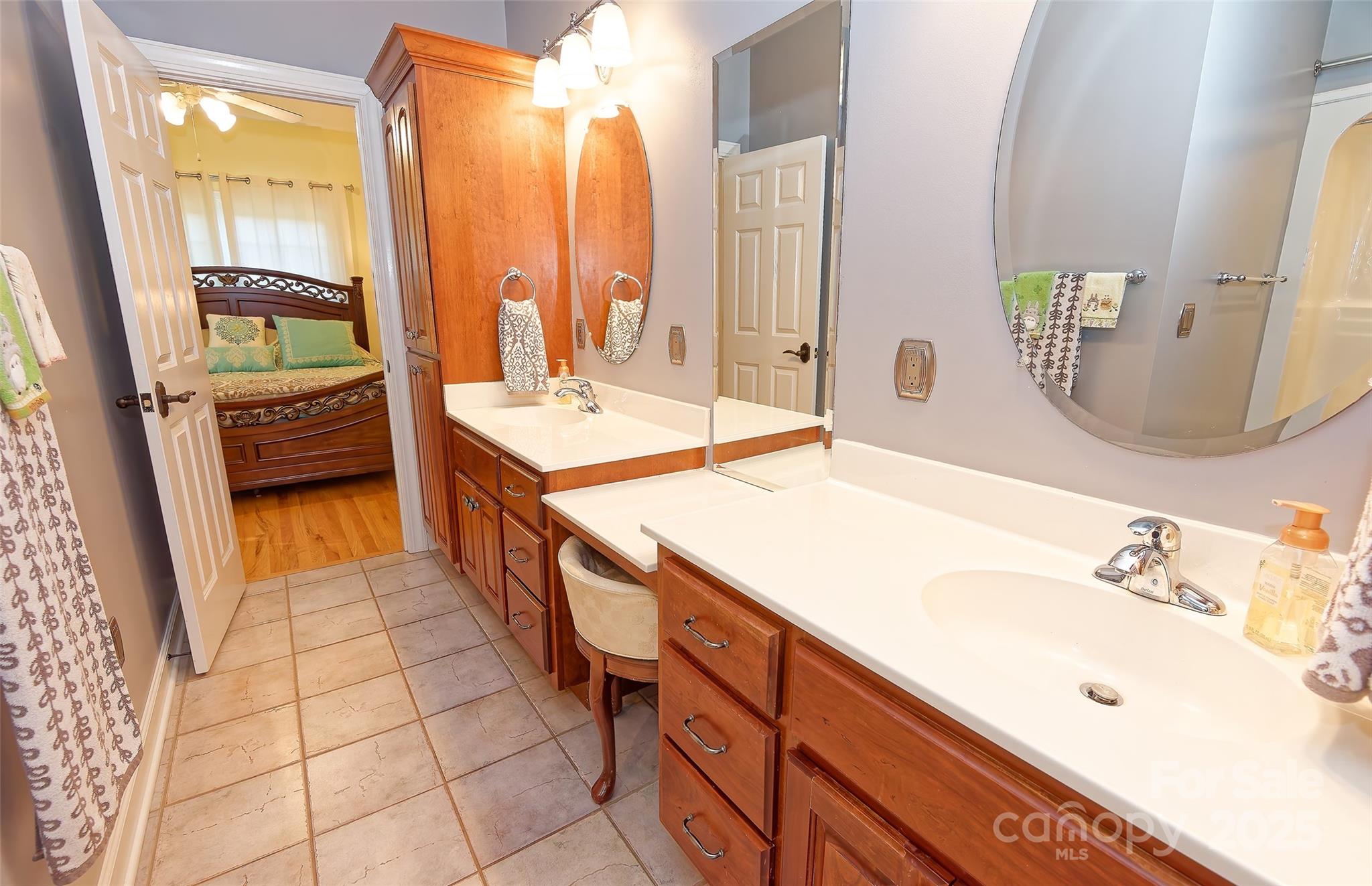 1250 Mountain Creek Road Rutherfordton, NC 28139 - Photo 27 of 48 a spacious bathroom with a double vanity sink a mirror and a shower