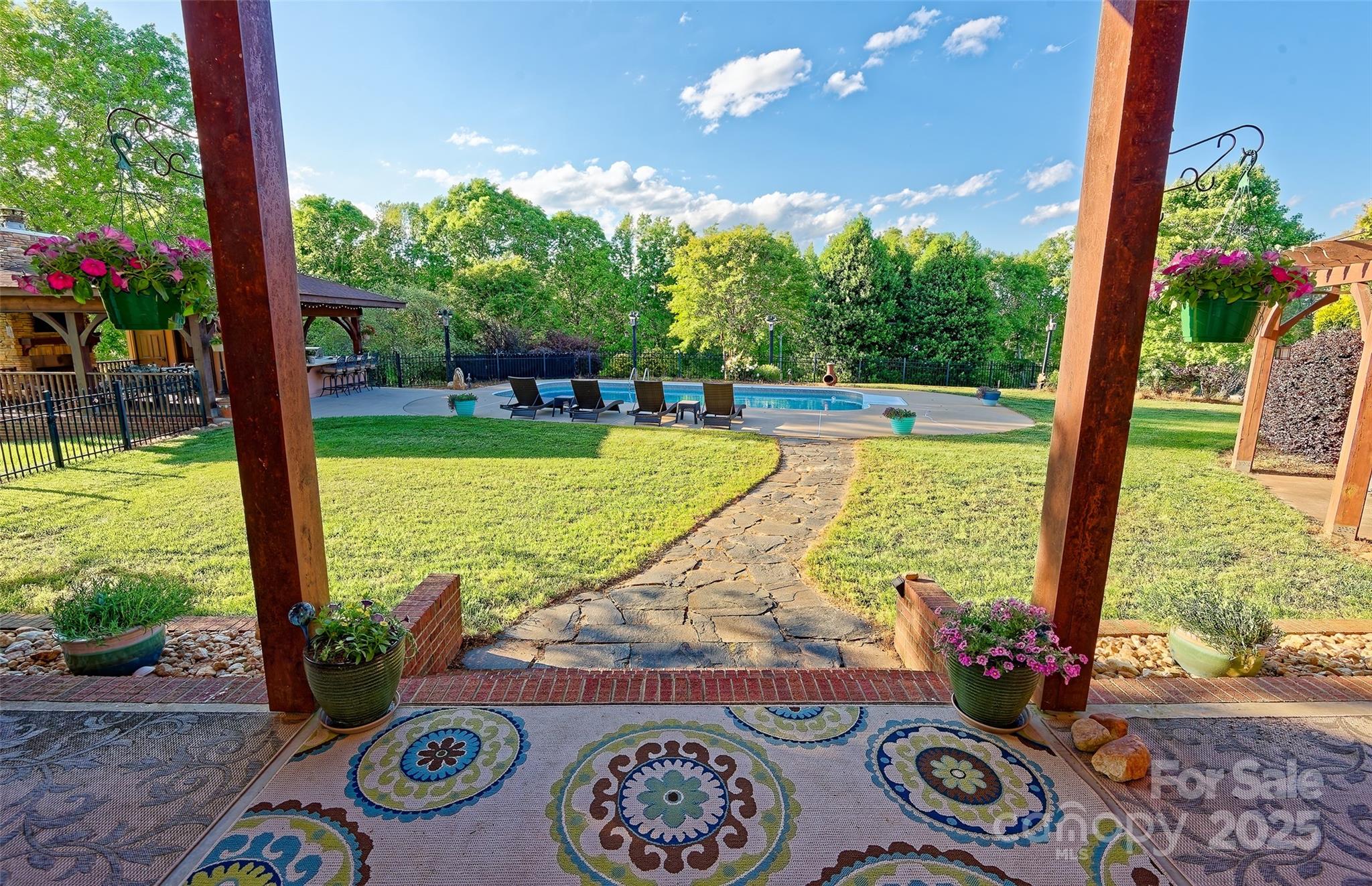 1250 Mountain Creek Road Rutherfordton, NC 28139 - Photo 34 of 48 a view of a swimming pool with a patio