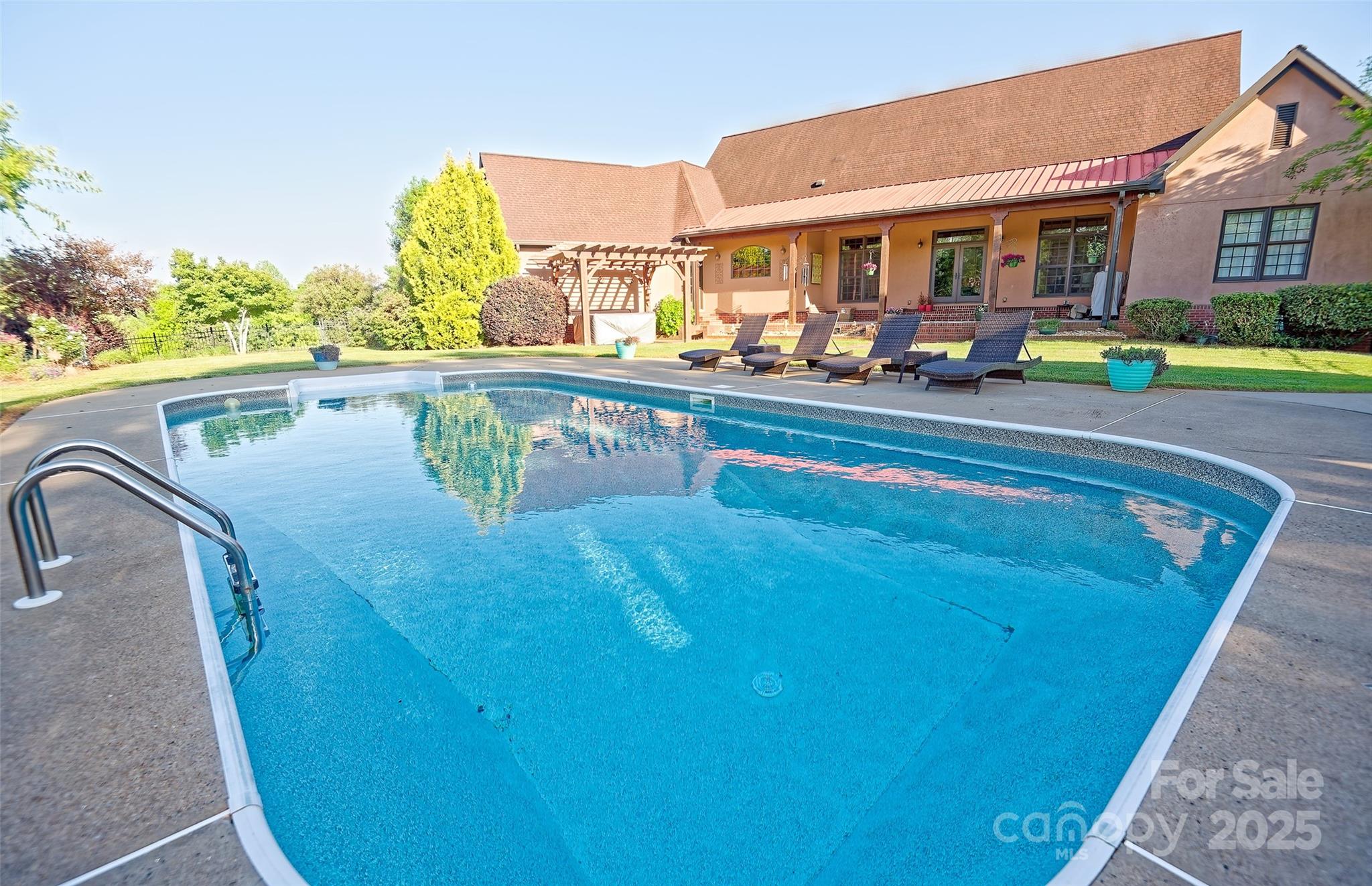 1250 Mountain Creek Road Rutherfordton, NC 28139 - Photo 36 of 48 a view of swimming pool with outdoor seating