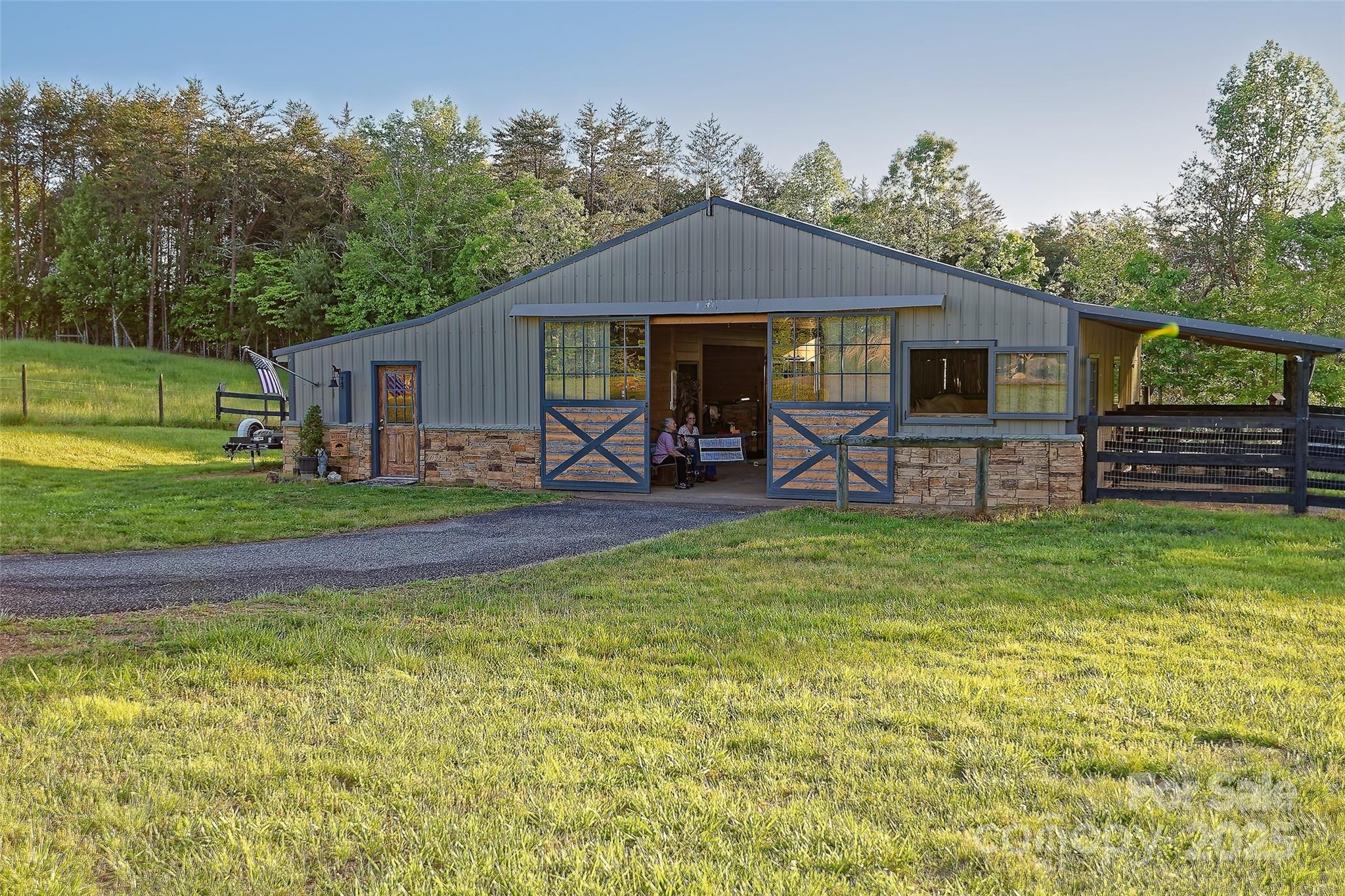1250 Mountain Creek Road Rutherfordton, NC 28139 - Photo 37 of 48 a view of a house with a yard balcony and sitting area