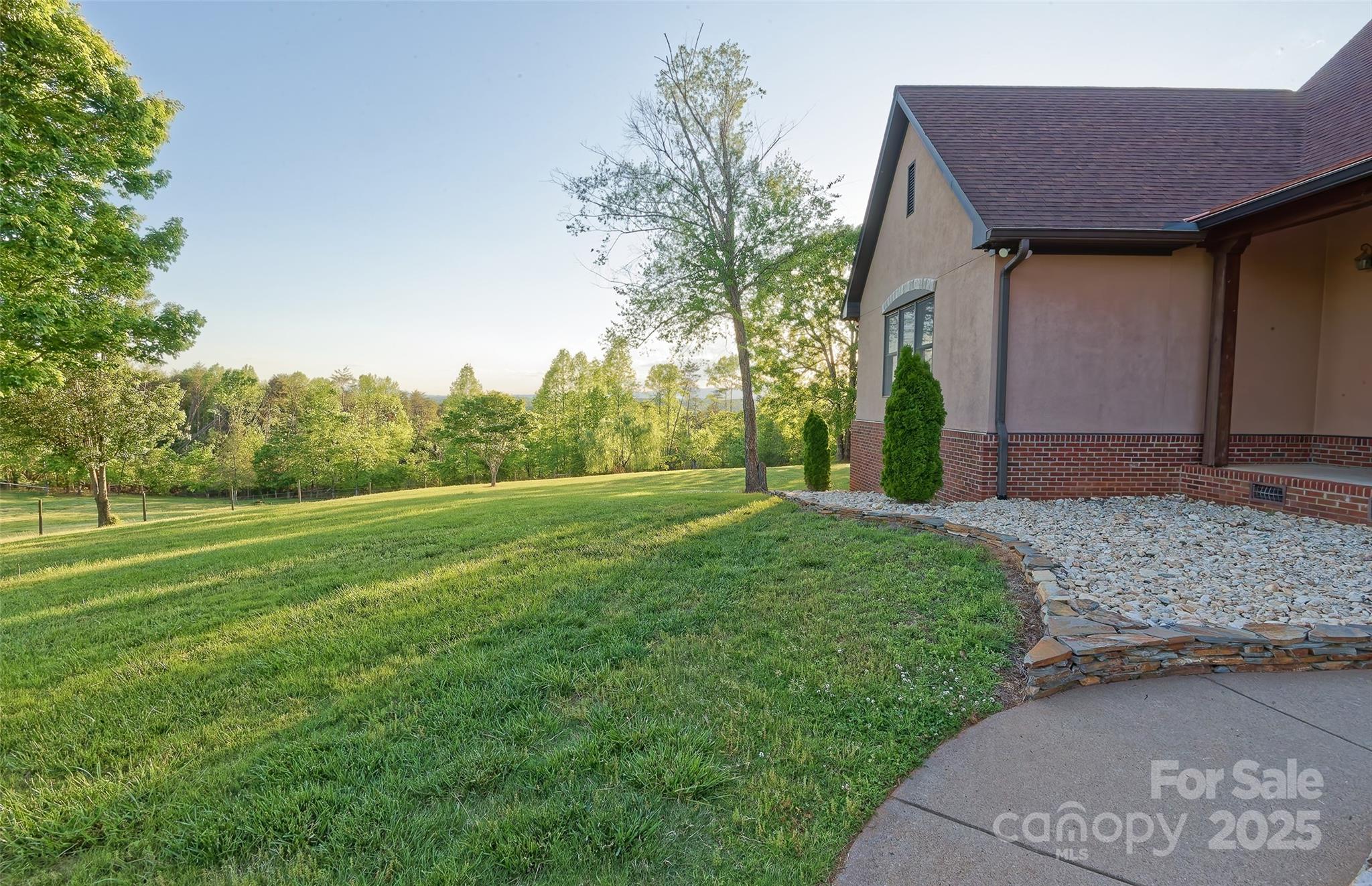 1250 Mountain Creek Road Rutherfordton, NC 28139 - Photo 6 of 48 a house view with a garden space