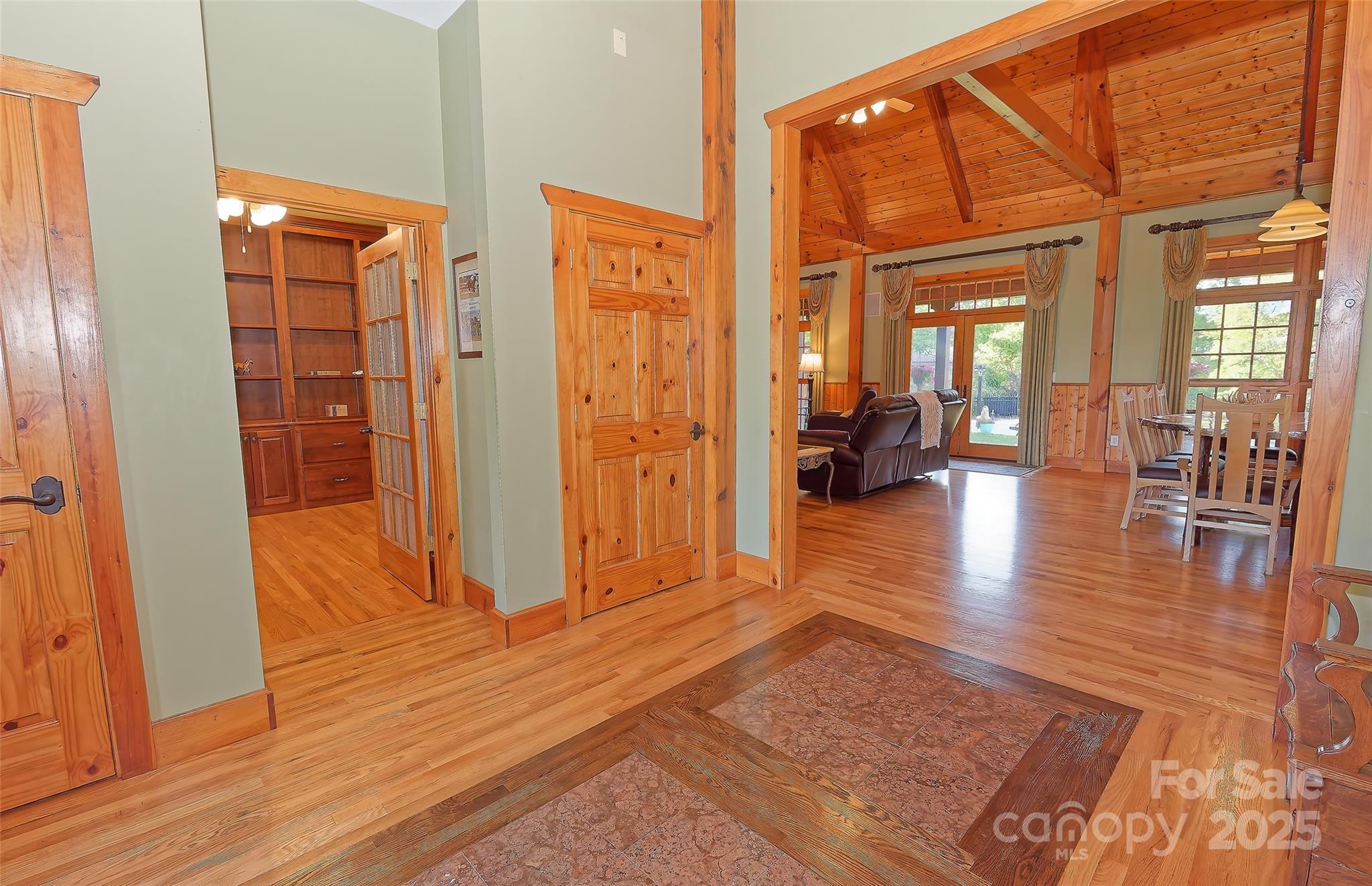1250 Mountain Creek Road Rutherfordton, NC 28139 - Photo 8 of 48 wooden floor in a hall with an entryway and livingroom