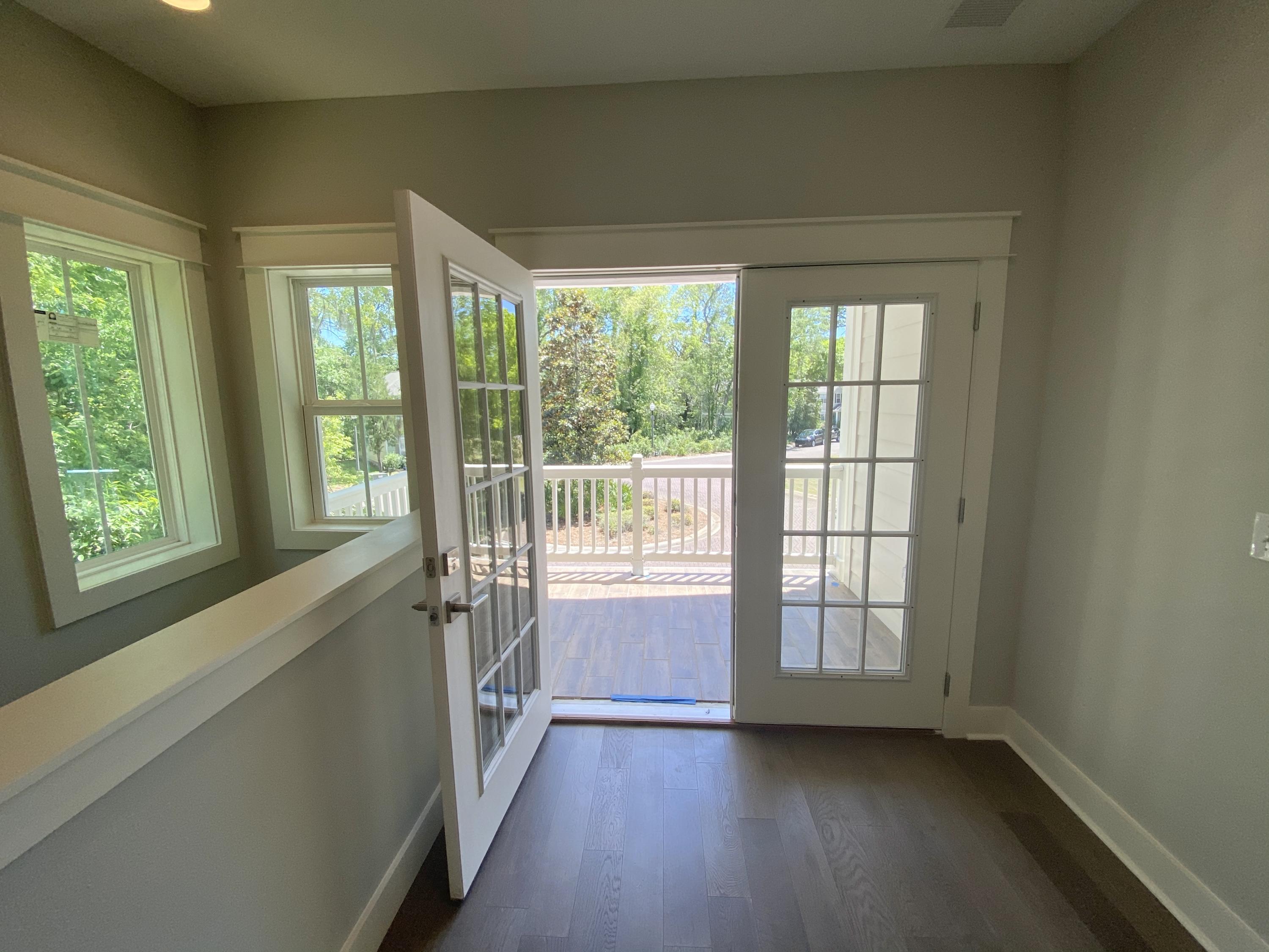 103 Rearden Way Santa Rosa Beach, FL 32459 - Photo 17 of 31 a view of an empty room with wooden floor and a window