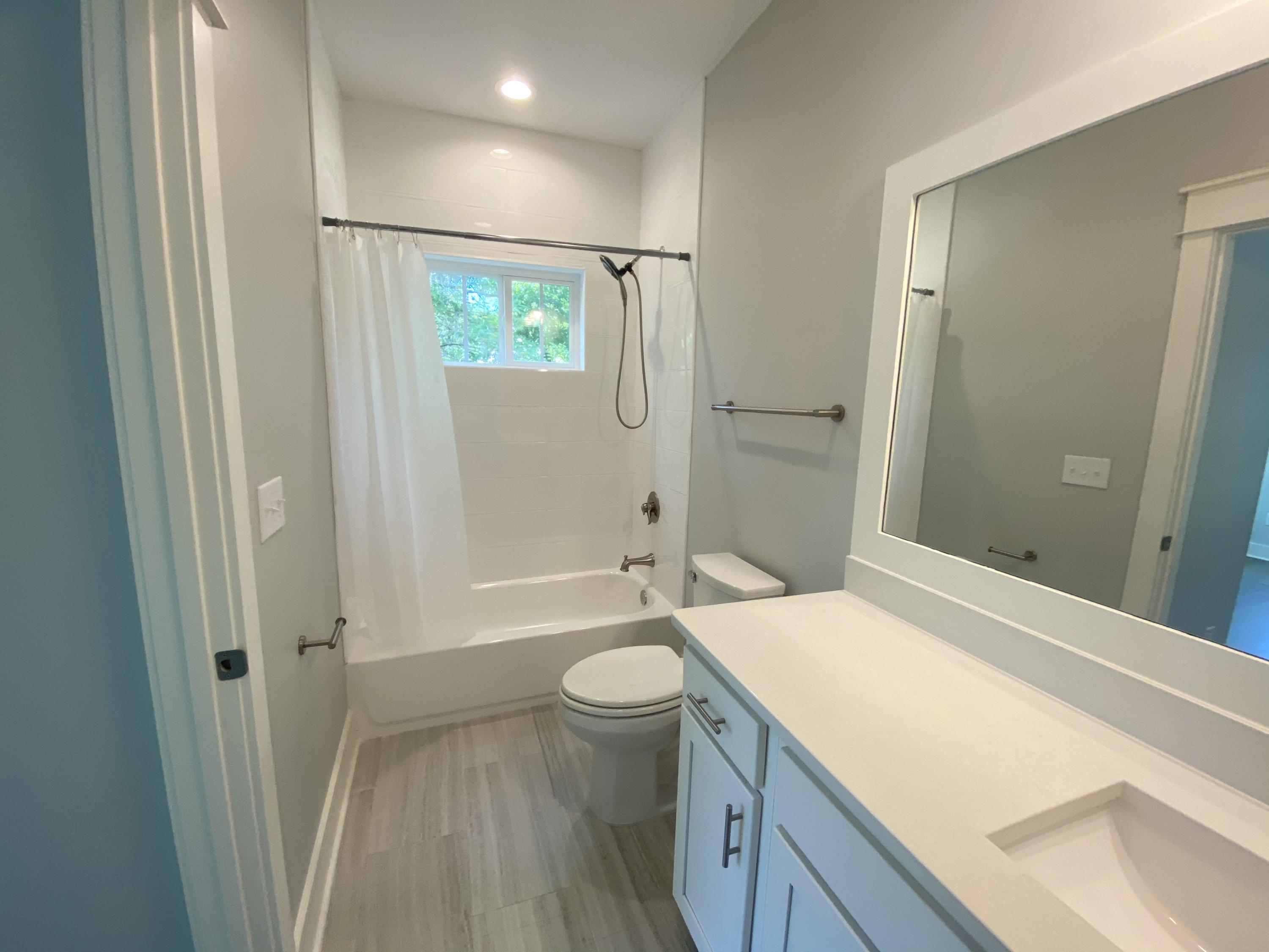 103 Rearden Way Santa Rosa Beach, FL 32459 - Photo 24 of 31 a bathroom with a sink a toilet and shower