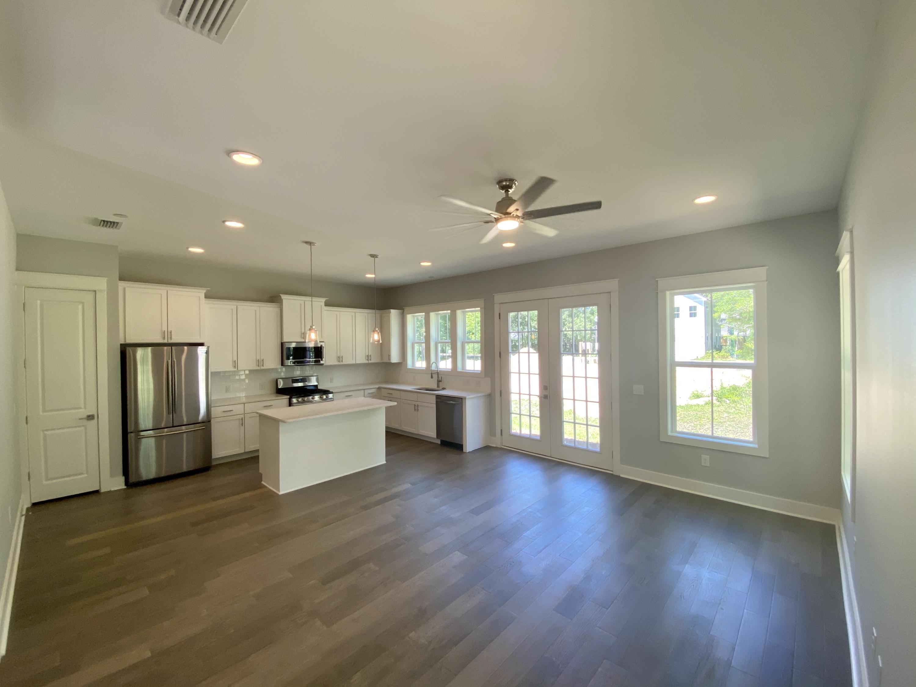 103 Rearden Way Santa Rosa Beach, FL 32459 - Photo 9 of 31 a view of a kitchen with refrigerator and windows