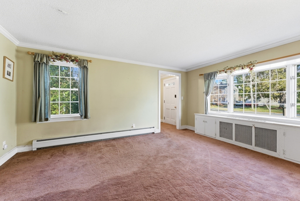289 Morgan Street South Hadley, MA 01075 - Photo 2 of 42 an empty room with windows