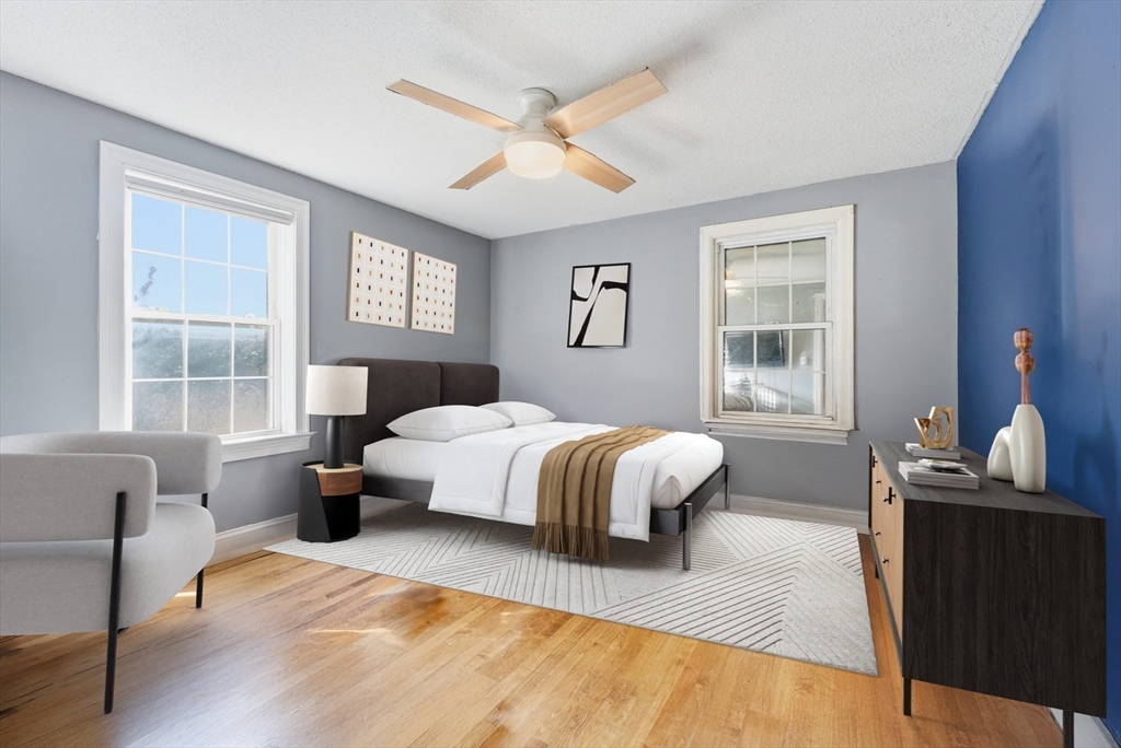 289 Morgan Street South Hadley, MA 01075 - Photo 24 of 42 a bedroom with a large bed and windows