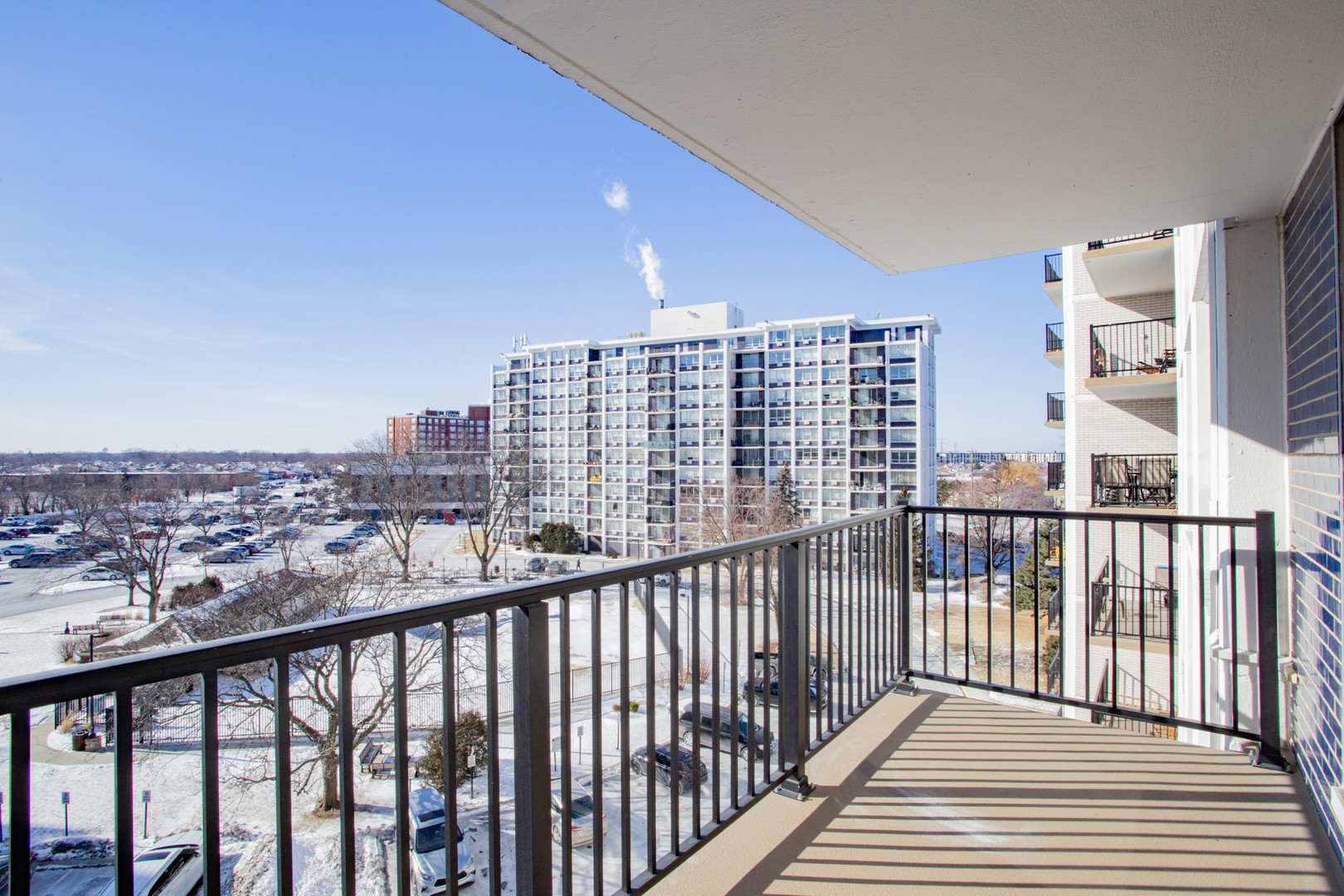 8801 West Golf Road, Unit 6B Niles, IL 60714 - Photo 11 of 13 a view of city from a balcony