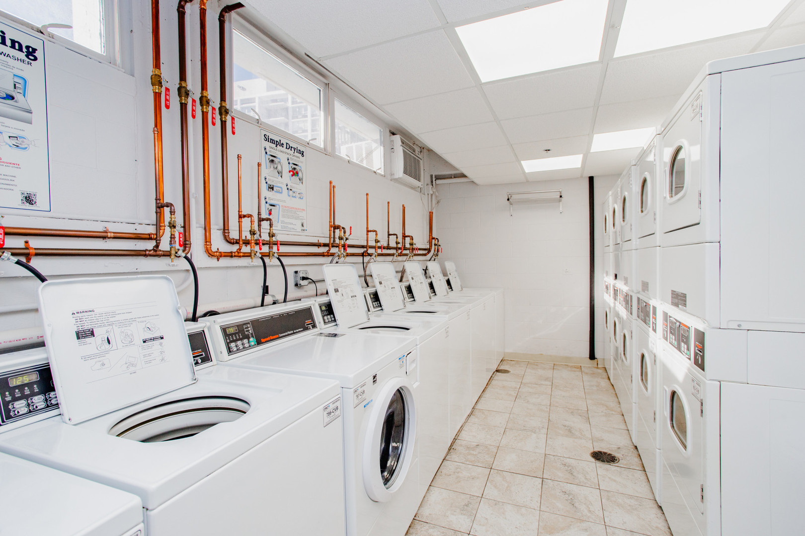 8801 West Golf Road, Unit 6B Niles, IL 60714 - Photo 13 of 13 a utility room with dryer and washer