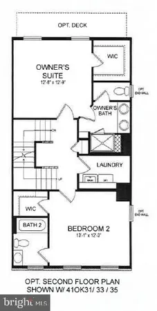 a living room with furniture and a dining table with kitchen view