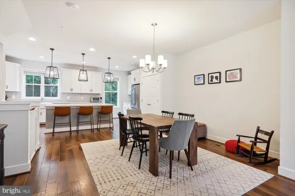 a kitchen that has a lot of cabinets in it