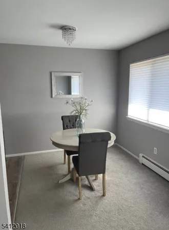 a workspace with furniture and window
