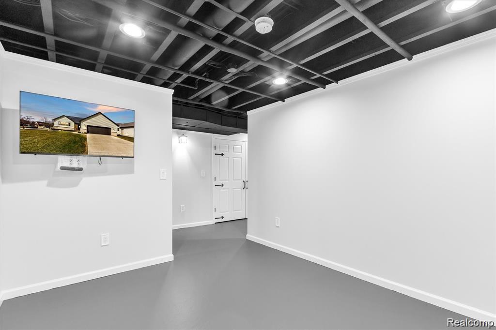 9769 Stark Road Livonia, MI 48150 - Photo 40 of 64 Yes another room with a Flat screen. 4 flatscreen TV's total in finished basement!!!