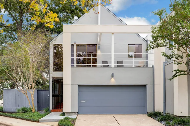 a view of a white building among the street
