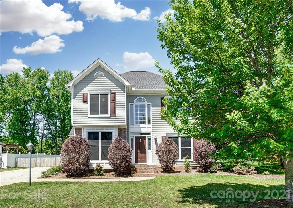 1999 Steeplechase Drive Rock Hill, SC 29732 - Photo 2 of 34 a front view of a house with a garden and plants