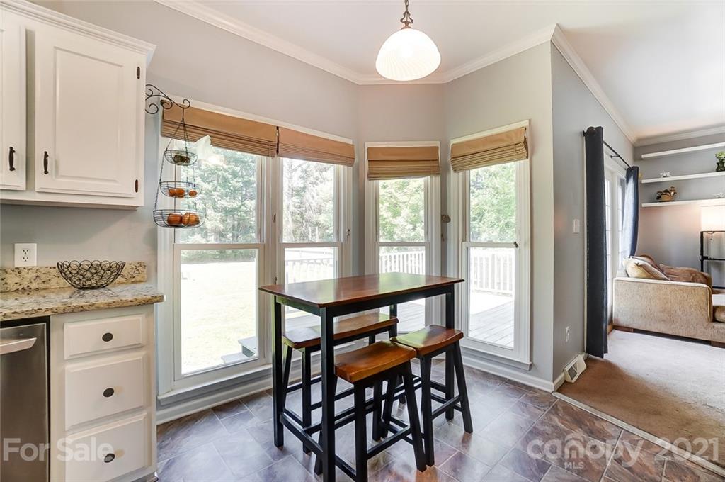 1999 Steeplechase Drive Rock Hill, SC 29732 - Photo 14 of 34 a view of a dining room with furniture and a window
