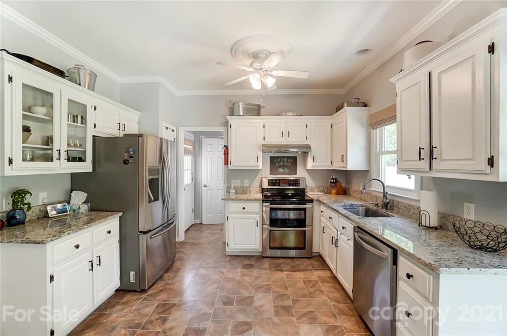 1999 Steeplechase Drive Rock Hill, SC 29732 - Photo 15 of 34 a kitchen with stainless steel appliances sink stove refrigerator and cabinets
