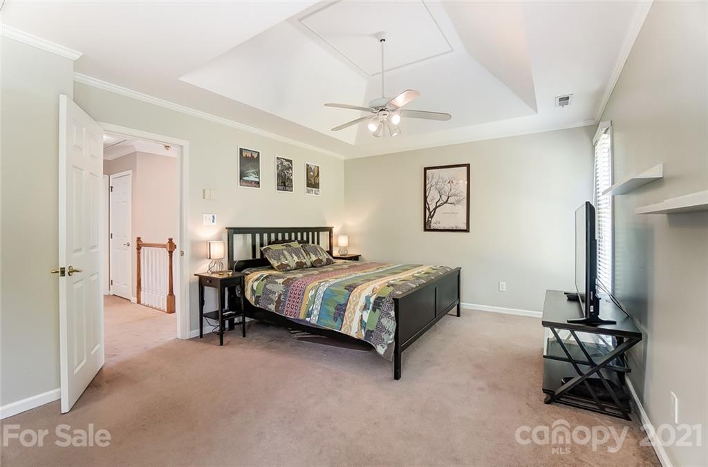 1999 Steeplechase Drive Rock Hill, SC 29732 - Photo 22 of 34 a bedroom with a bed and a table in it