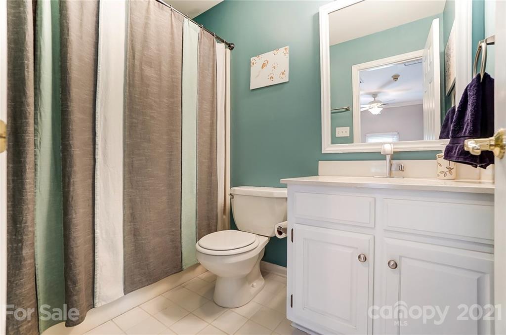1999 Steeplechase Drive Rock Hill, SC 29732 - Photo 27 of 34 a bathroom with a sink toilet and shower