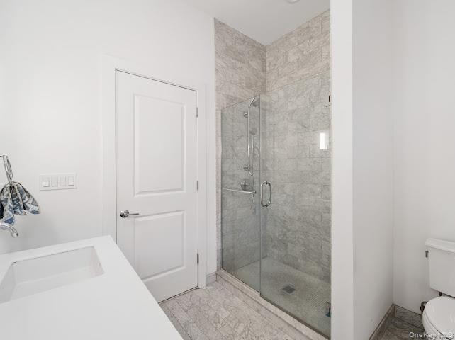 11 Island Point Bronx, NY 10464 - Photo 12 of 20 a bathroom with a shower and toilet