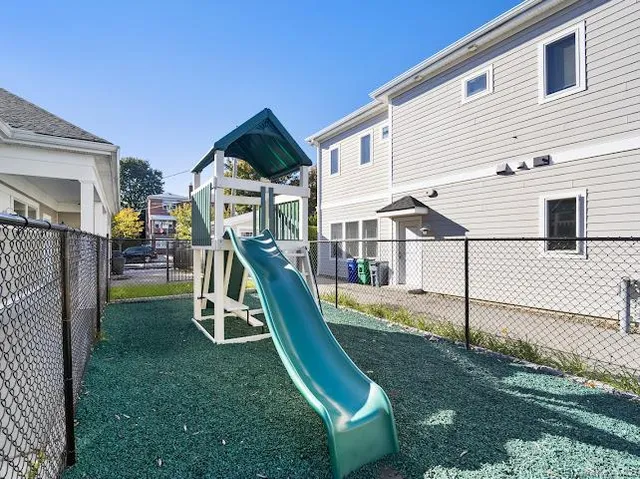 a view of a house with a park