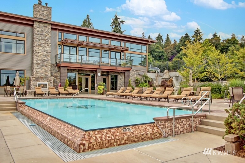 41 Pine Street, Unit 213 Edmonds, WA 98020 - Photo 21 of 25 a view of a house with swimming pool