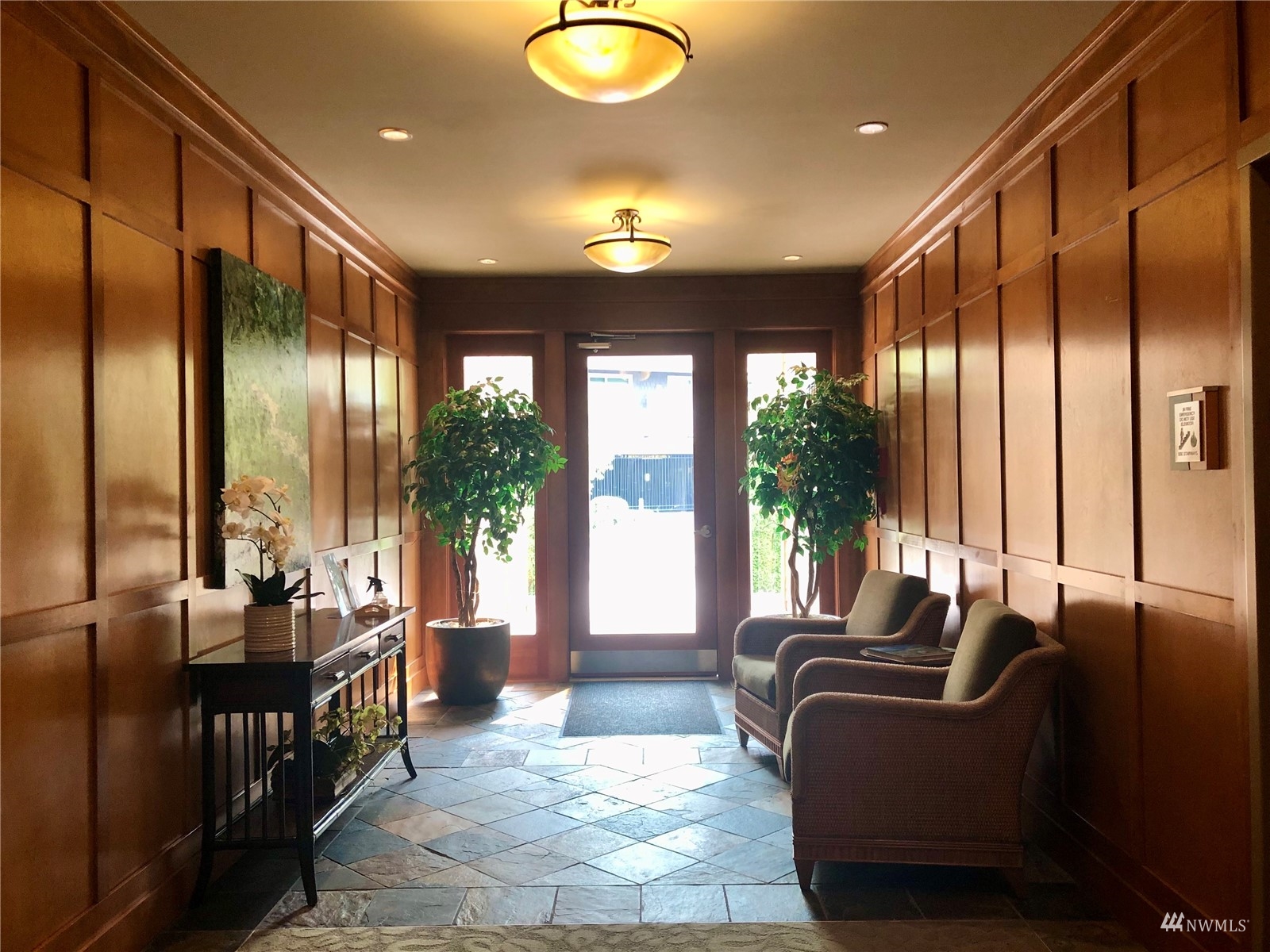 41 Pine Street, Unit 213 Edmonds, WA 98020 - Photo 4 of 25 a living room with furniture and a large window