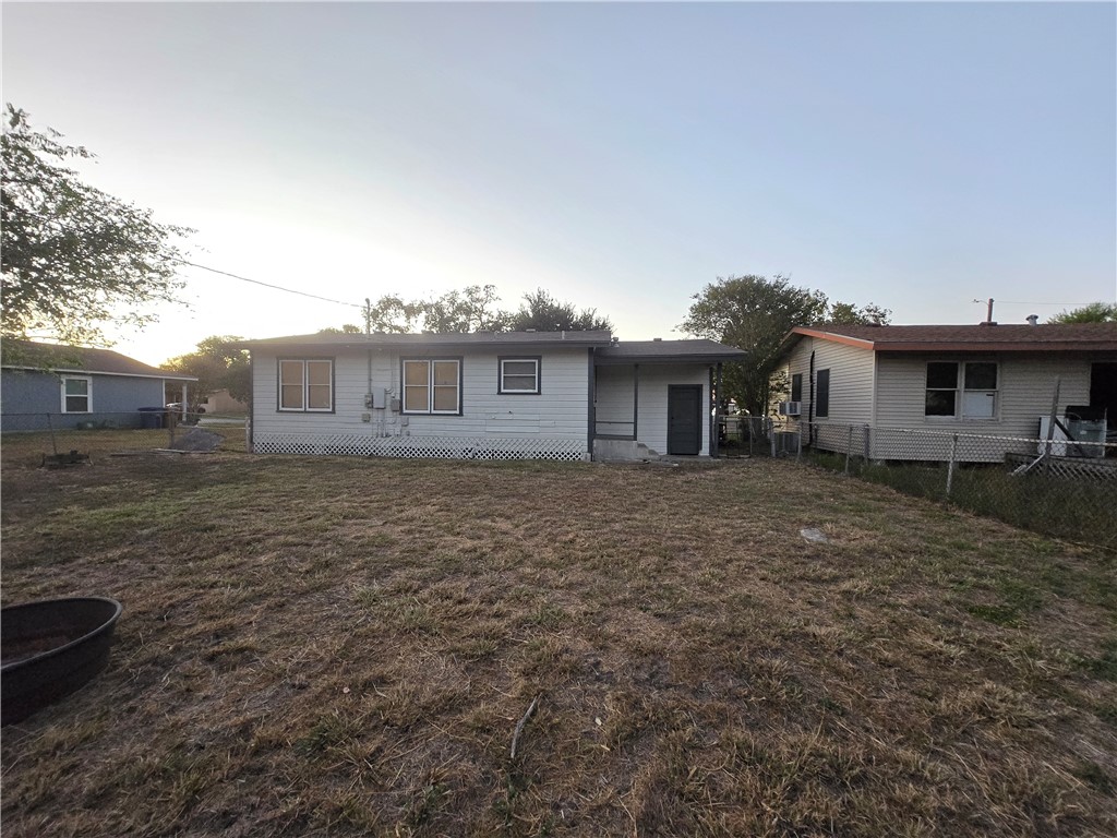 1122 Rickey Drive Corpus Christi, TX 78412 - Photo 8 of 8 a front view of a house with a garden