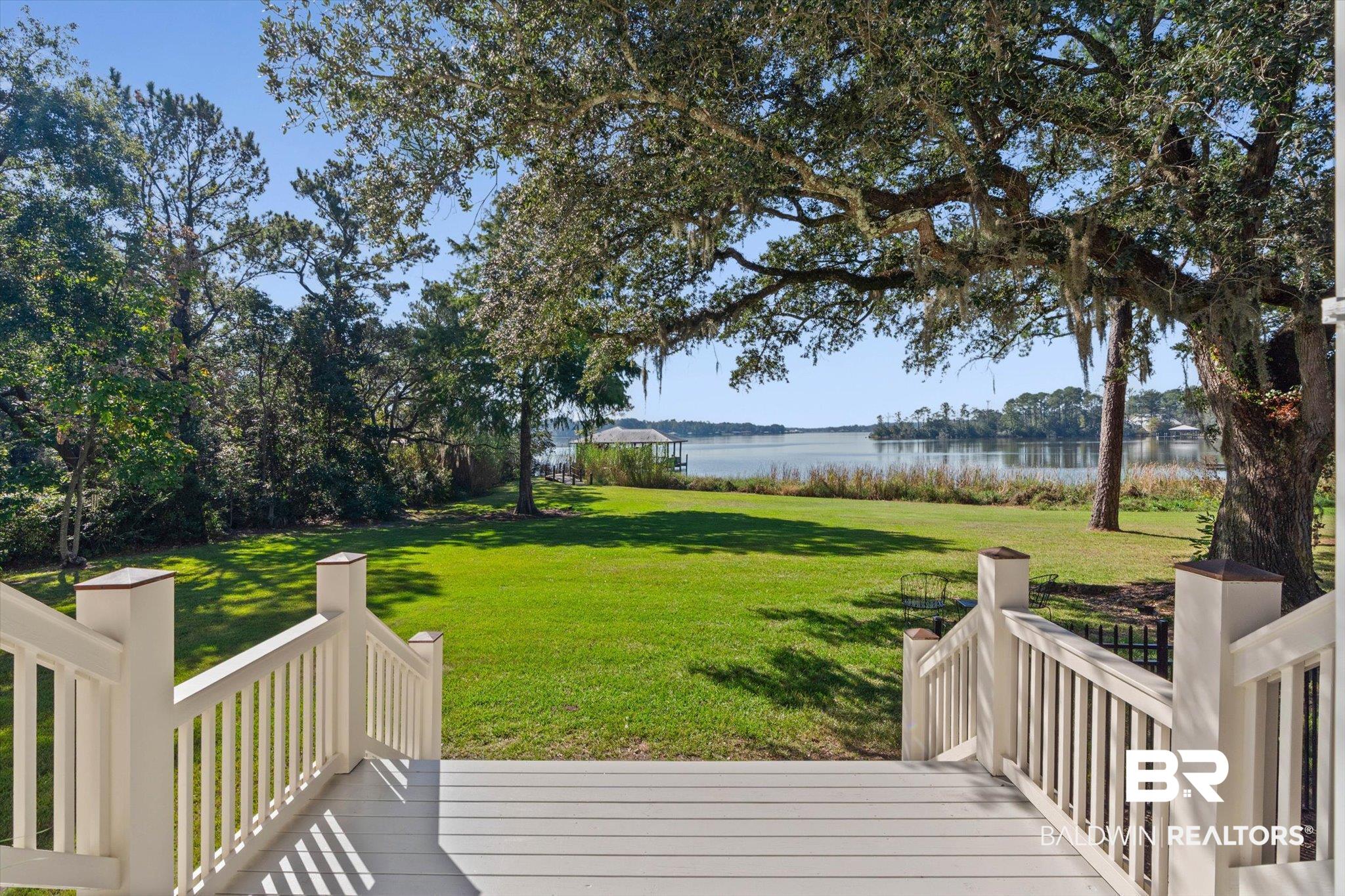 2415 Venetia Road Mobile, AL 36605 - Photo 35 of 50 View of grassy yard with a deck with water view