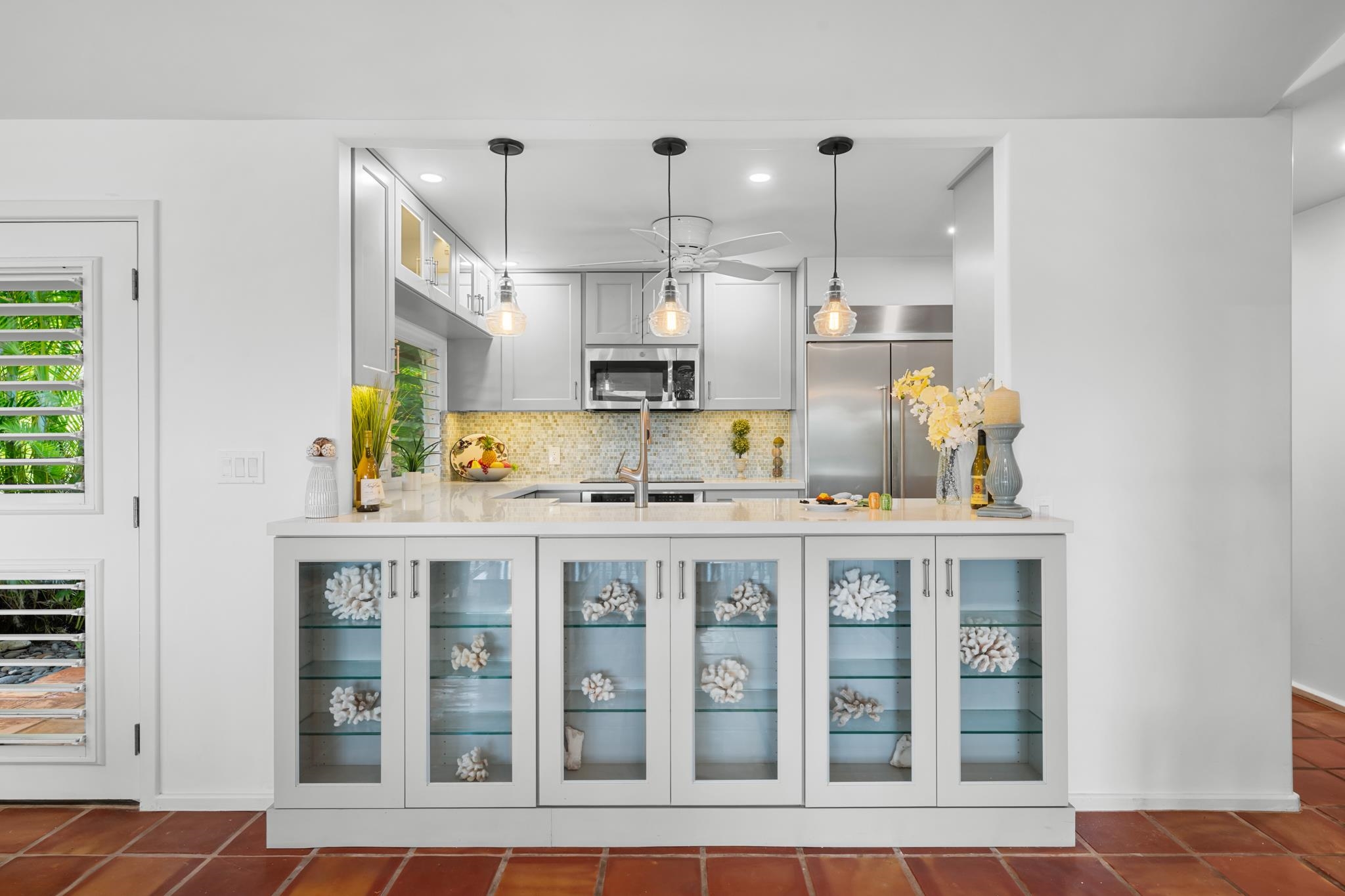20 Hui Road East, Unit 35 Lahaina, HI 96761 - Photo 1 of 50 a kitchen with stainless steel appliances granite countertop a sink and cabinets