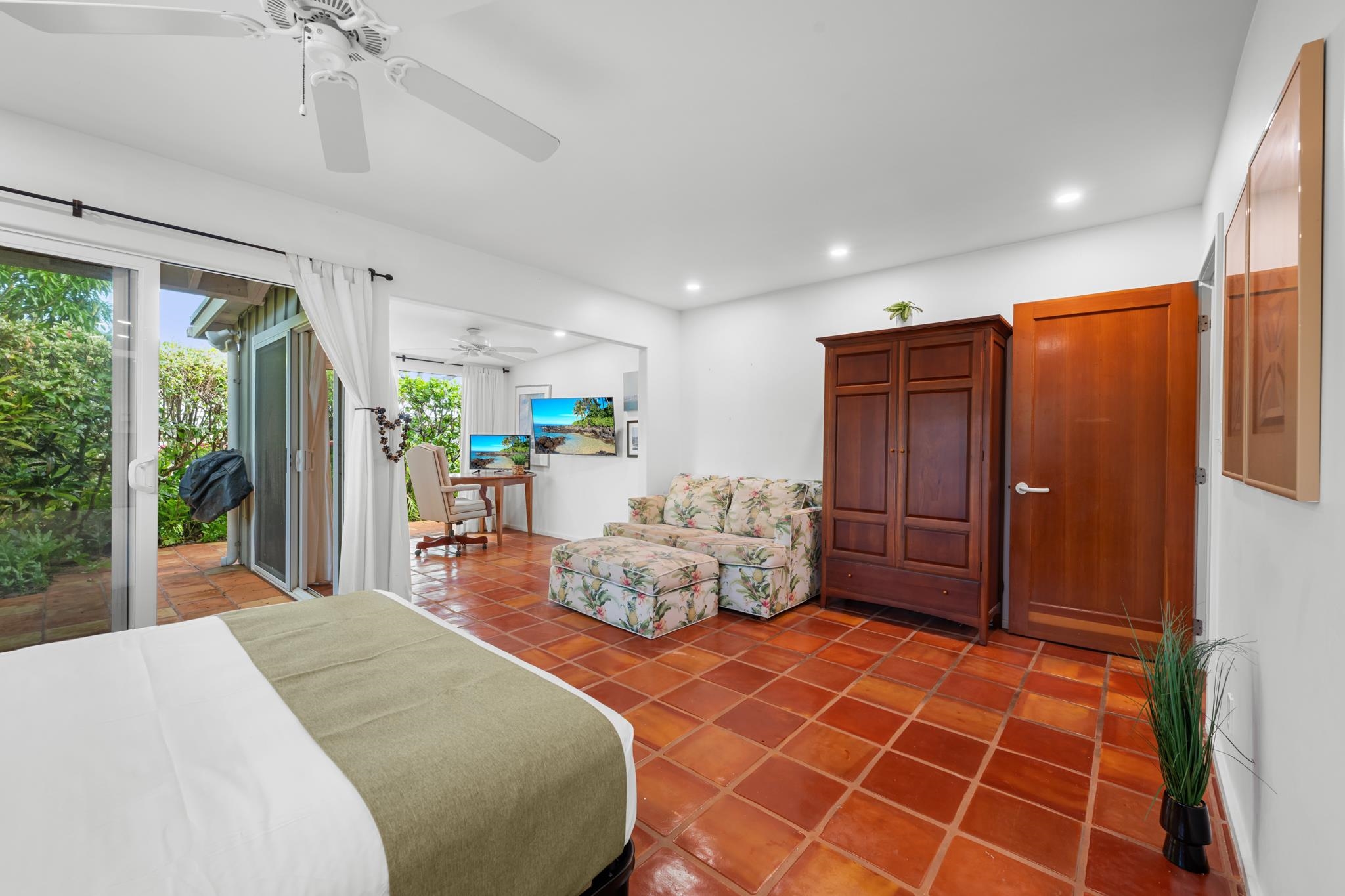 20 Hui Road East, Unit 35 Lahaina, HI 96761 - Photo 15 of 50 a bedroom with furniture and large windows