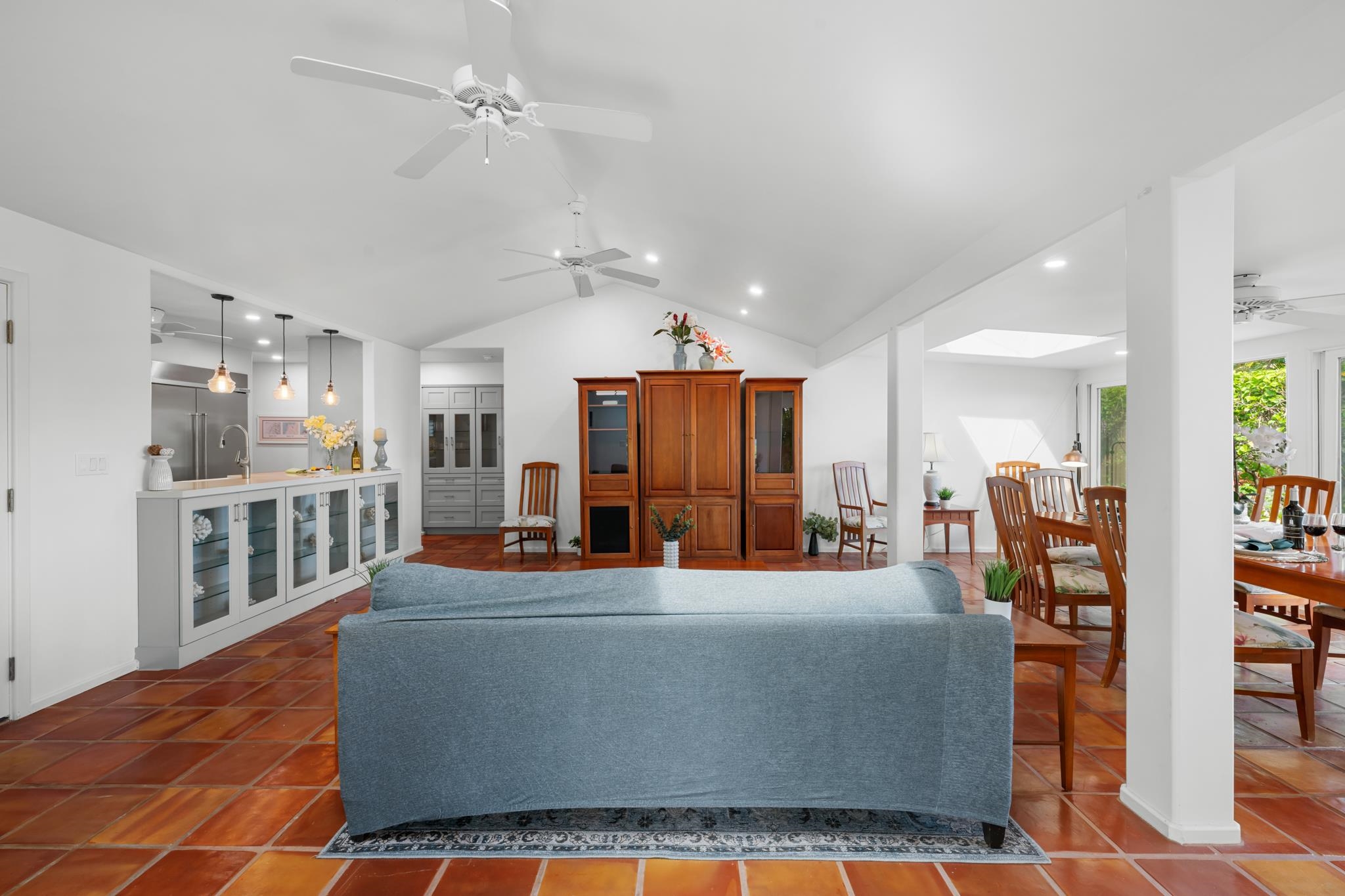 20 Hui Road East, Unit 35 Lahaina, HI 96761 - Photo 3 of 50 a living room with furniture a flat screen tv and a table