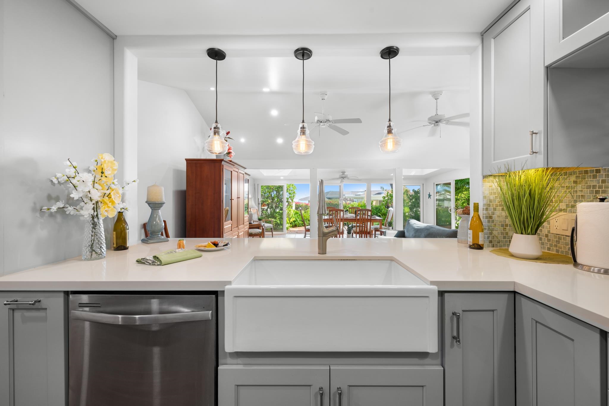 20 Hui Road East, Unit 35 Lahaina, HI 96761 - Photo 10 of 50 a kitchen with a sink and a refrigerator