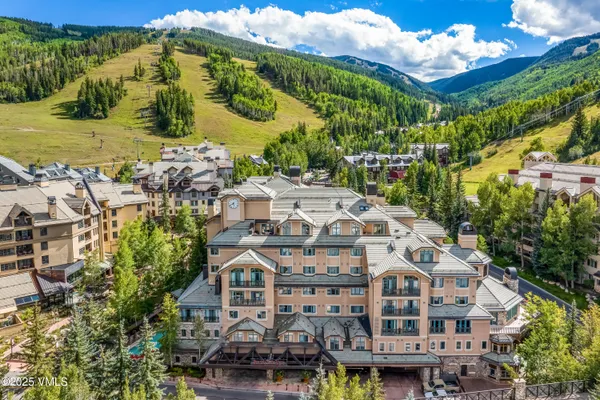 a view of a building with a garden