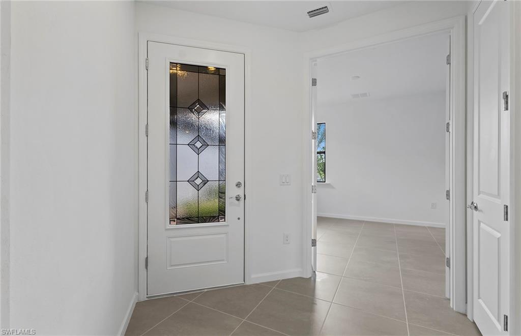 6407 Memorial Lane Ave Maria, FL 34142 - Photo 4 of 21 wooden floor in a en suite bathroom