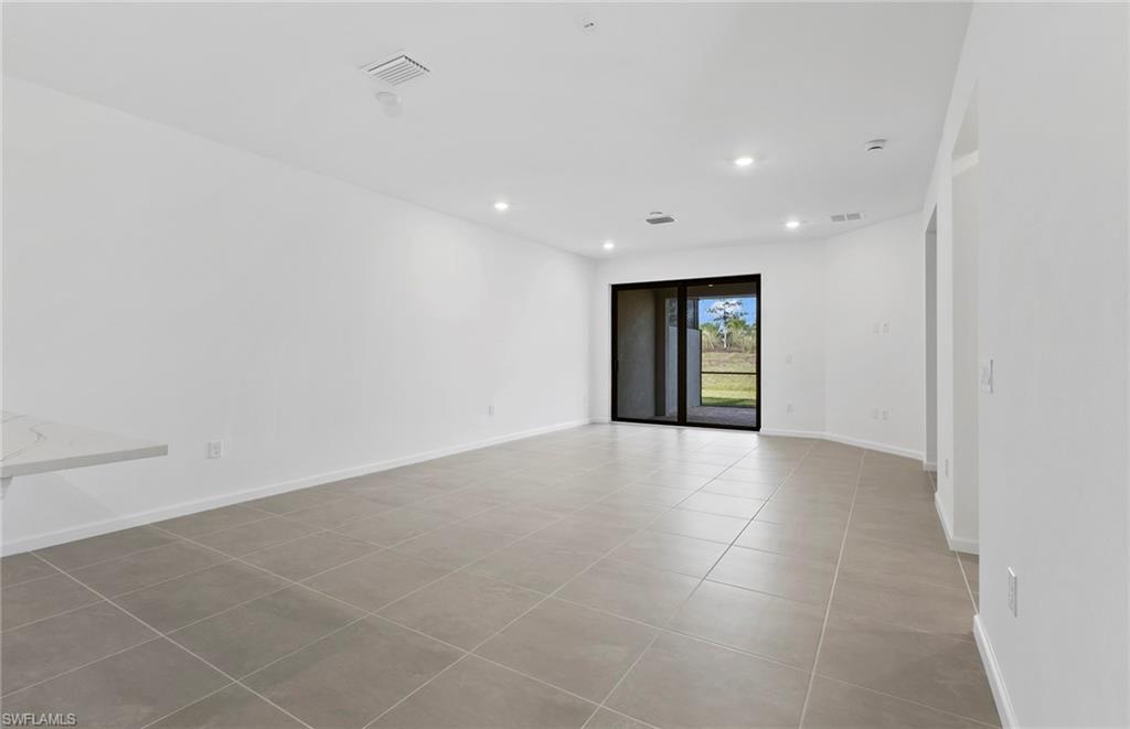 6407 Memorial Lane Ave Maria, FL 34142 - Photo 9 of 21 a view of an empty room with closet and window
