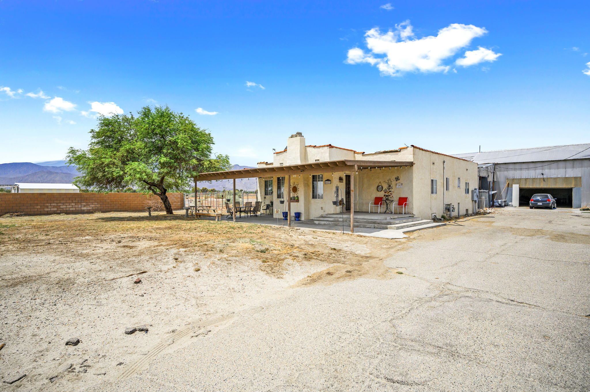 54521 Calhoun Street Thermal, CA 92274 - Photo 7 of 34 a view of a house with a yard