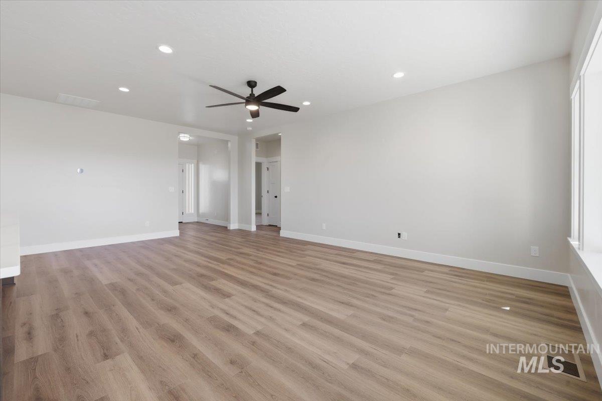 29343 Dixie Road Parma, ID 83660 - Photo 17 of 35 Spare room with light wood-type flooring, ceiling fan, and recessed lighting