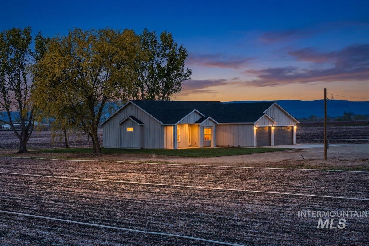 29343 Dixie Road Parma, ID 83660 - Photo 3 of 35 Modern farmhouse style home featuring concrete driveway and an attached garage