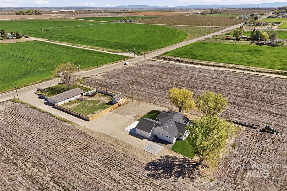 29343 Dixie Road Parma, ID 83660 - Photo 8 of 35 Aerial view of sparsely populated area with extensive farmland